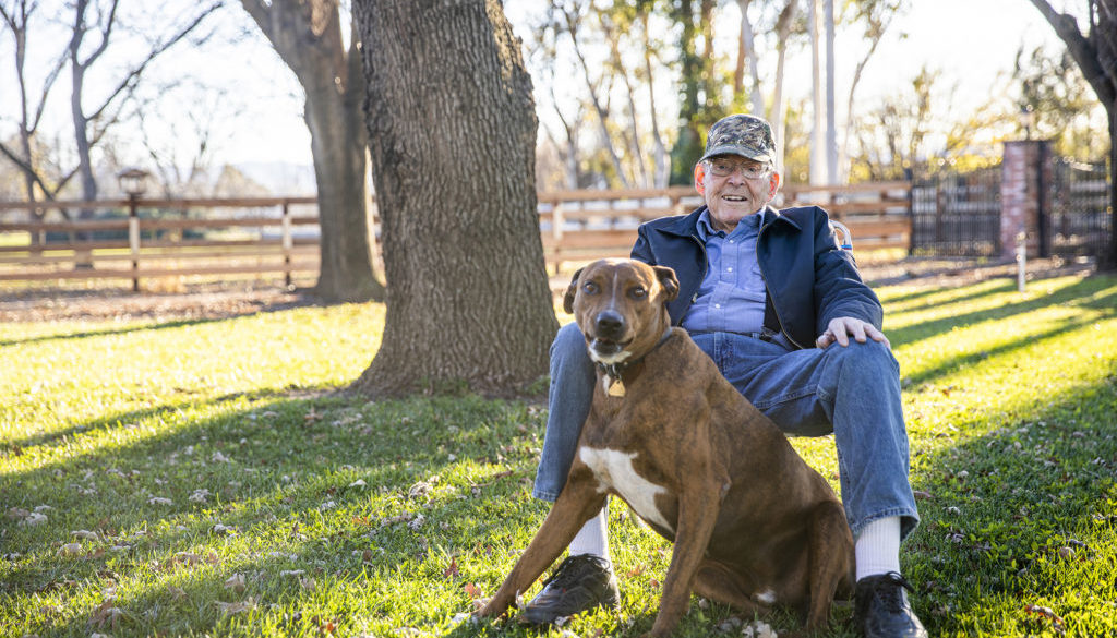 Portrait of a Senior Veteran with his Dog